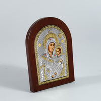 Silver-plated icon of the Virgin Mary of Bethlehem for table or wall and rounded wooden frame